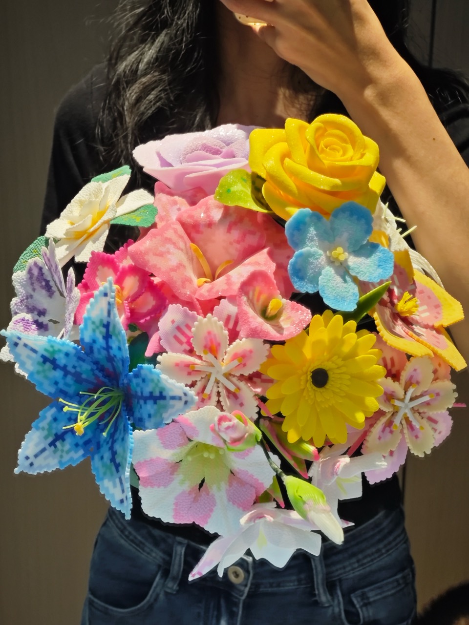A colorful bouquet of handmade three-dimensional bead flowers